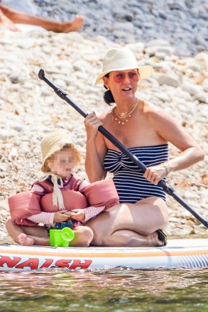 Saint-Tropez, FRANCE  - *EXCLUSIVE*  - Katy Perry, her fiancé Orlando Bloom, their daughter Daisy Dove and Orlando's son, Flynn Christopher make the most of their vacation on a yacht and on a pebble beach in the Gulf of Saint-Tropez, Côte d'Azur.  On the program: swimming, sunbathing, and paddling. The couple kiss tenderly while swimming.
Shot ono 7/18/23

Pictured: Katy Perry, Orlando Bloom

BACKGRID USA 25 JULY 2023 

BYLINE MUST READ: Best Image / BACKGRID

USA: +1 310 798 9111 / usasales@backgrid.com

UK: +44 208 344 2007 / uksales@backgrid.com

*UK Clients - Pictures Containing Children
Please Pixelate Face Prior To Publication*