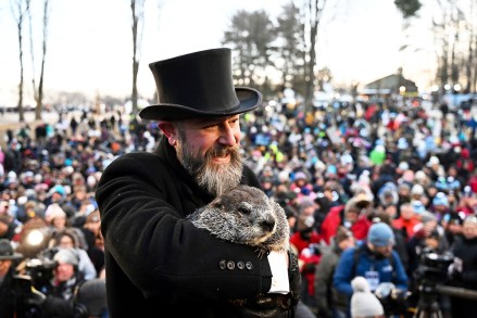 Groundhog Club handler A.J. Dereume holds Punxsutawney Phil, the weather prognosticating groundhog, during the 137th celebration of Groundhog Day on Gobbler's Knob in Punxsutawney, Pa., . Phil's handlers said that the groundhog has forecast six more weeks of winter
Groundhog Day, Punxsutawney, United States - 02 Feb 2023